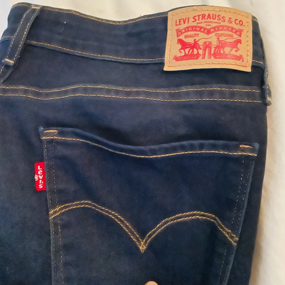 Indigo, no distress 711 Skinny Levi’s